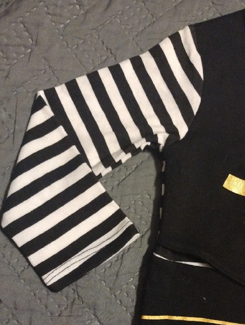 Baby Pirate One-Piece with Striped Sleeves and Gold Accents